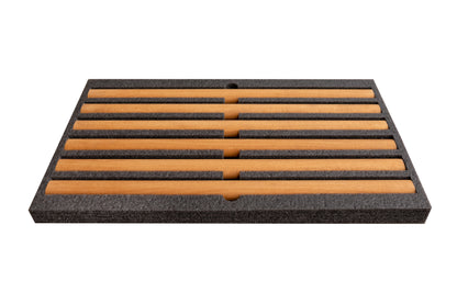 The 733B — pull-up bar, dip station, and bench on one wall.